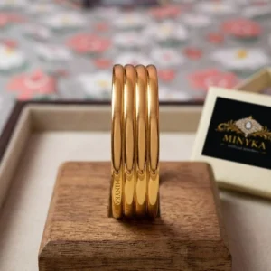 Minyka Classic Gold Finish Plain Bangles – Set of 4